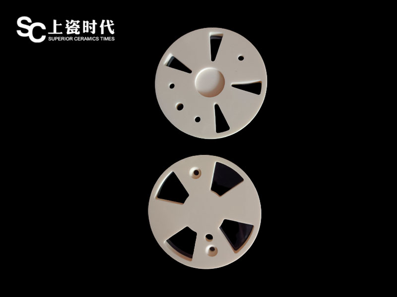 Injection molded valve disc